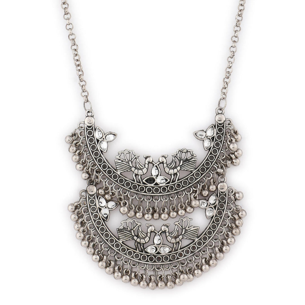 silver oxidized long necklace with a crescent-shaped pendant close-up
