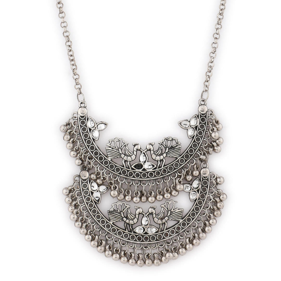 silver oxidized long necklace with a crescent-shaped pendant close-up