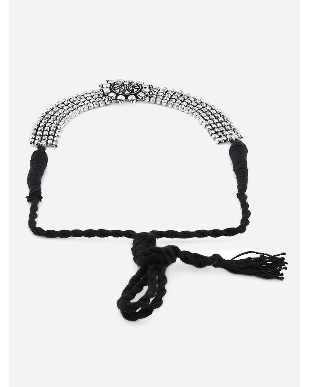 A silver oxidised choker necklace with a circular mandala-inspired pendant at the center, suspended from a black thread chain side view
