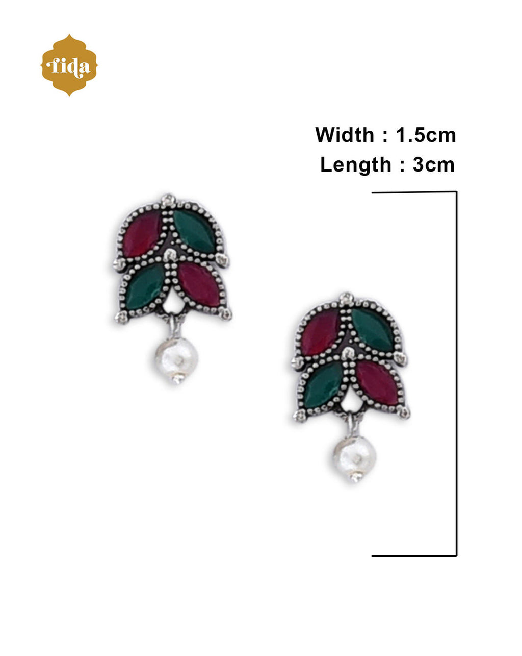 A silver-plated oxidised temple jewellery set with white pearls and green and red stones, featuring a detailed pendant and a pair of earrings. dimension