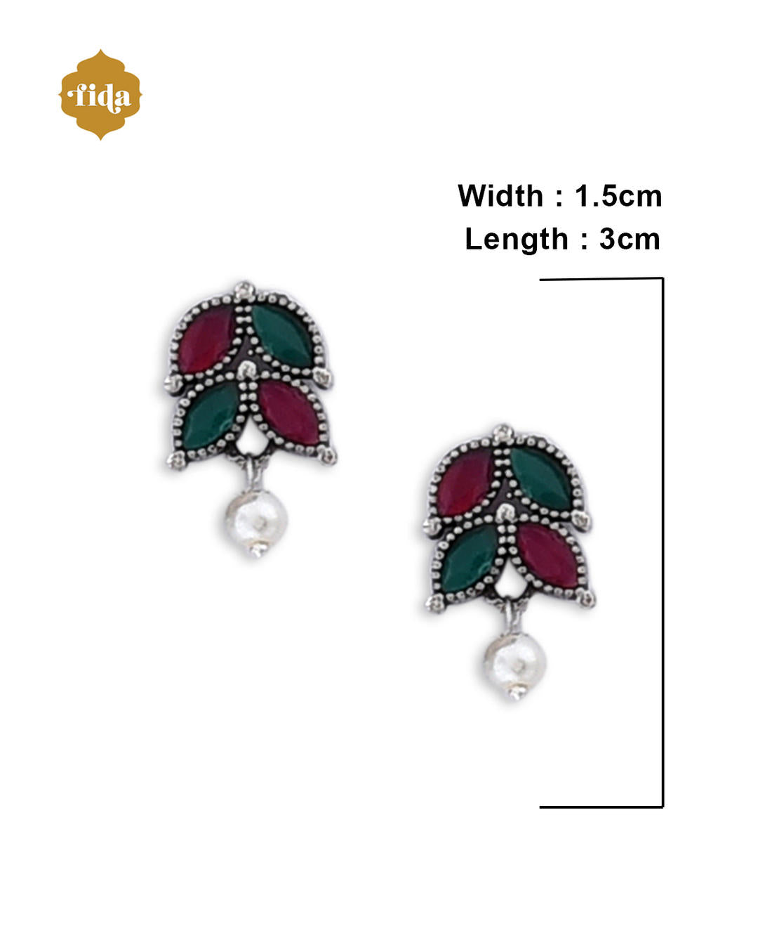 A silver-plated oxidised temple jewellery set with white pearls and green and red stones, featuring a detailed pendant and a pair of earrings. dimension