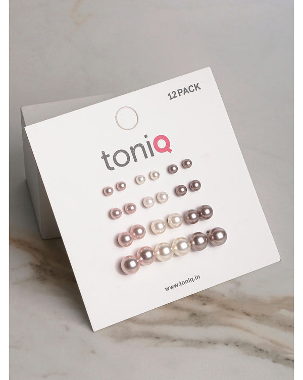 A set of ToniQ branded pearl stud earrings in white, pink, and grey, presented on a card with the earring designs displayed in three rows.