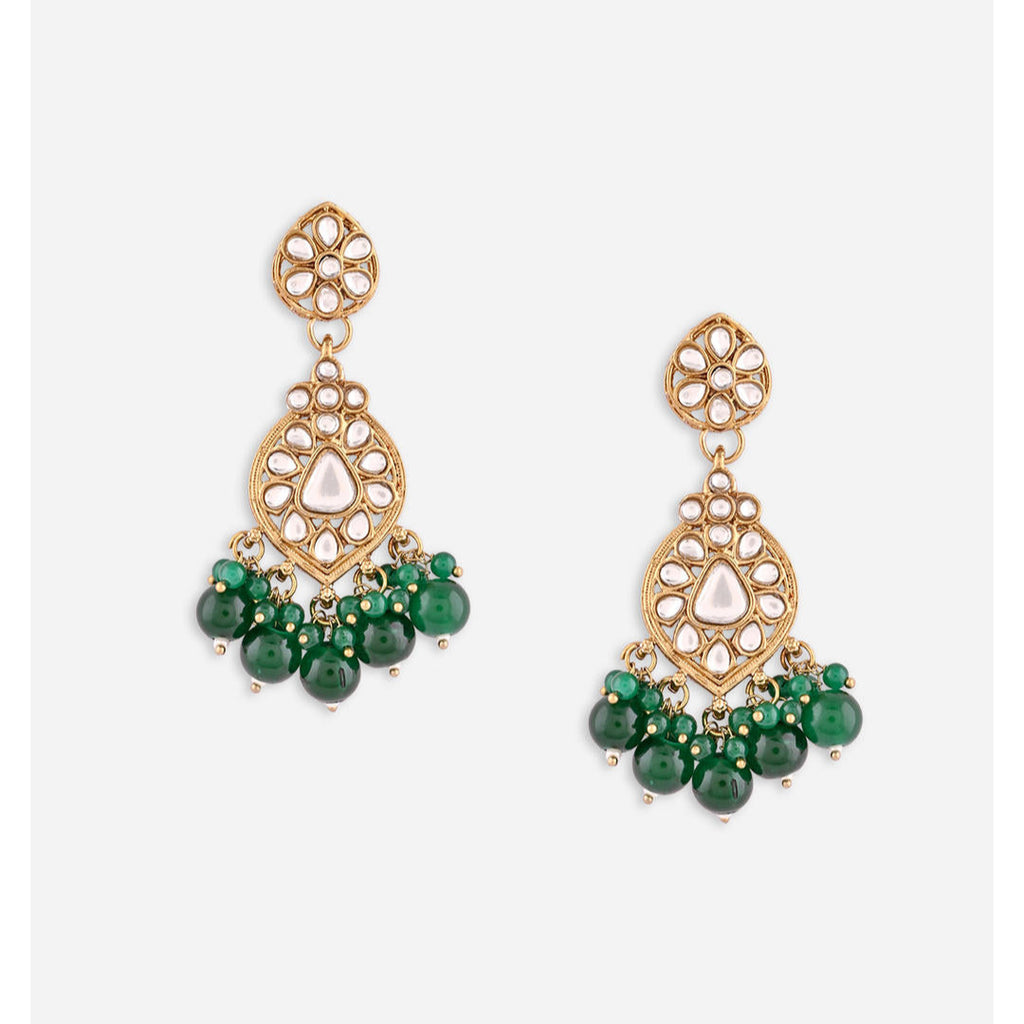 A pair of golden drop earrings with kundan stones and green beads