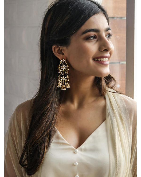 Discover Fida’s Kundan Grace Floral Gold Danglers—handcrafted floral earrings with kundan stones & crescent design, perfect for weddings & ethnic looks.