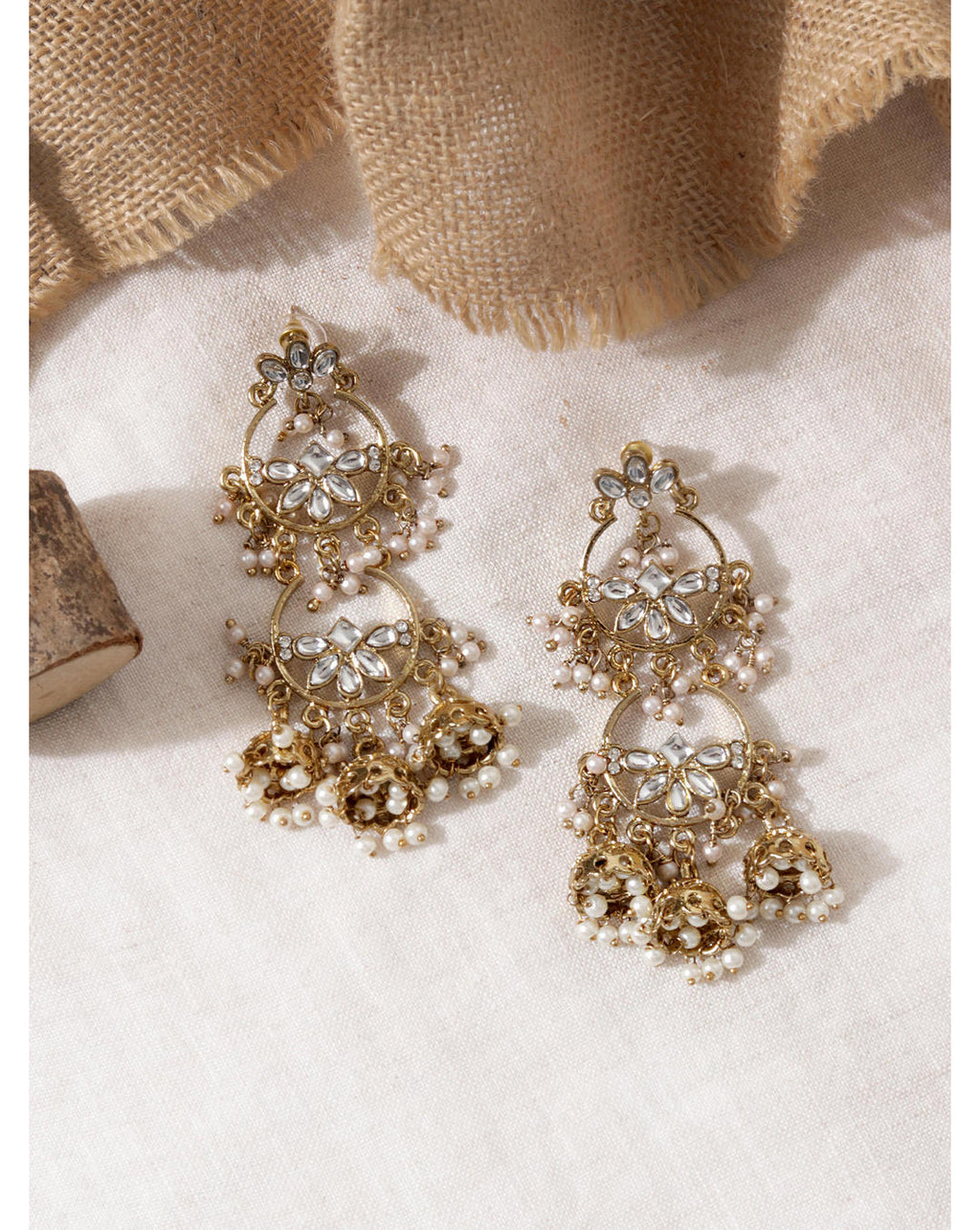 Discover Fida’s Kundan Grace Floral Gold Danglers – handcrafted floral earrings with kundan stones & crescent design, perfect for weddings & ethnic looks.