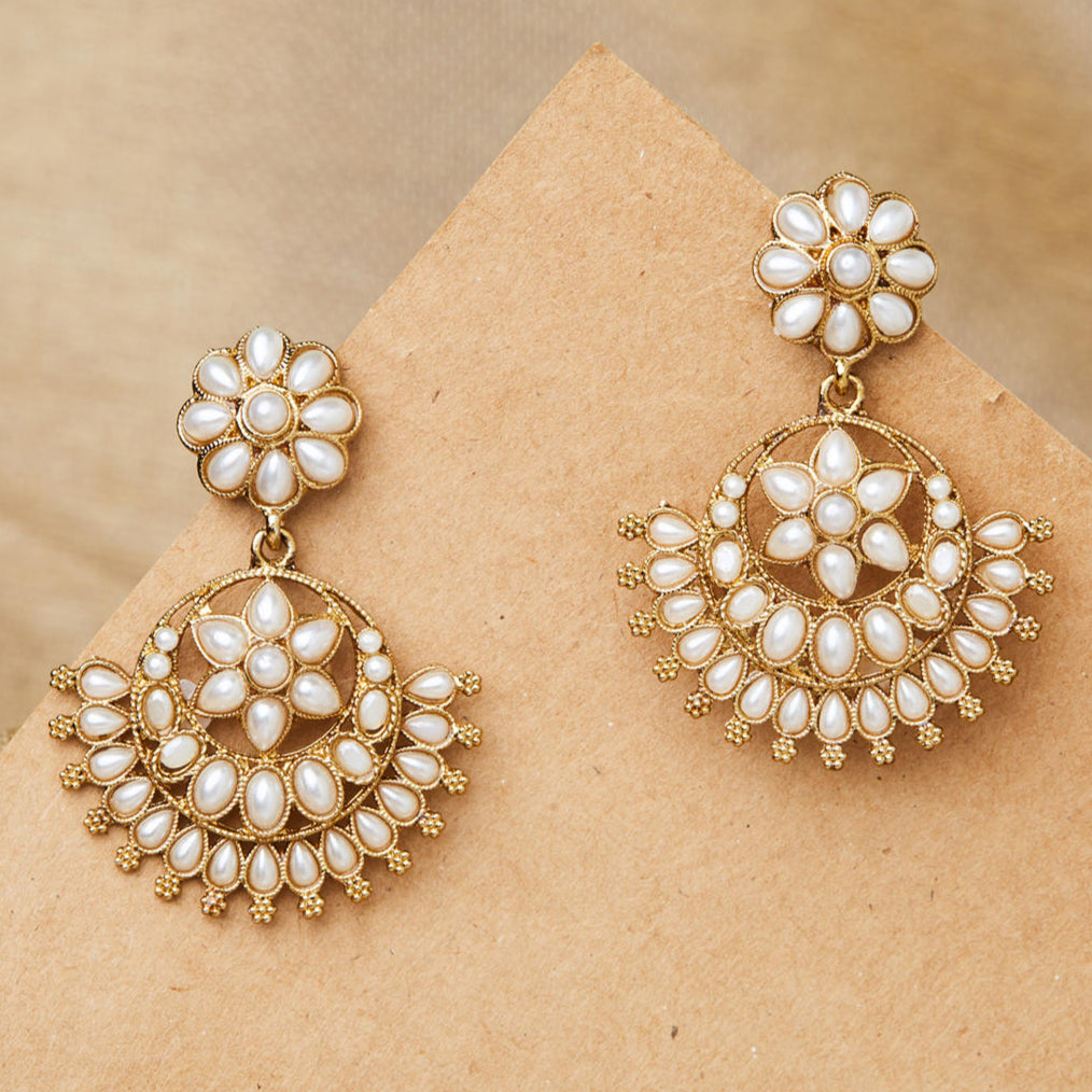 Pearl Bloom Floral White Chandbali Earrings with gold-tone floral motifs and pearl drops, handcrafted ethnic wedding jewellery