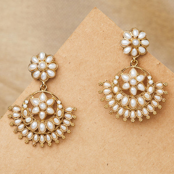 Pearl Bloom Floral White Chandbali Earrings with gold-tone floral motifs and pearl drops, handcrafted ethnic wedding jewellery