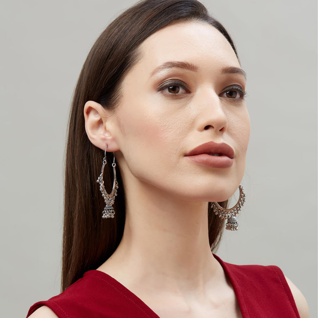 A pair of silver-plated oxidised oversized hoop jhumka earrings