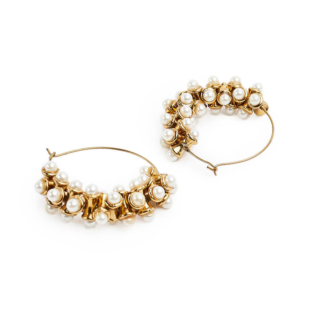 gold-plated hoop earring adorned with white pearls.