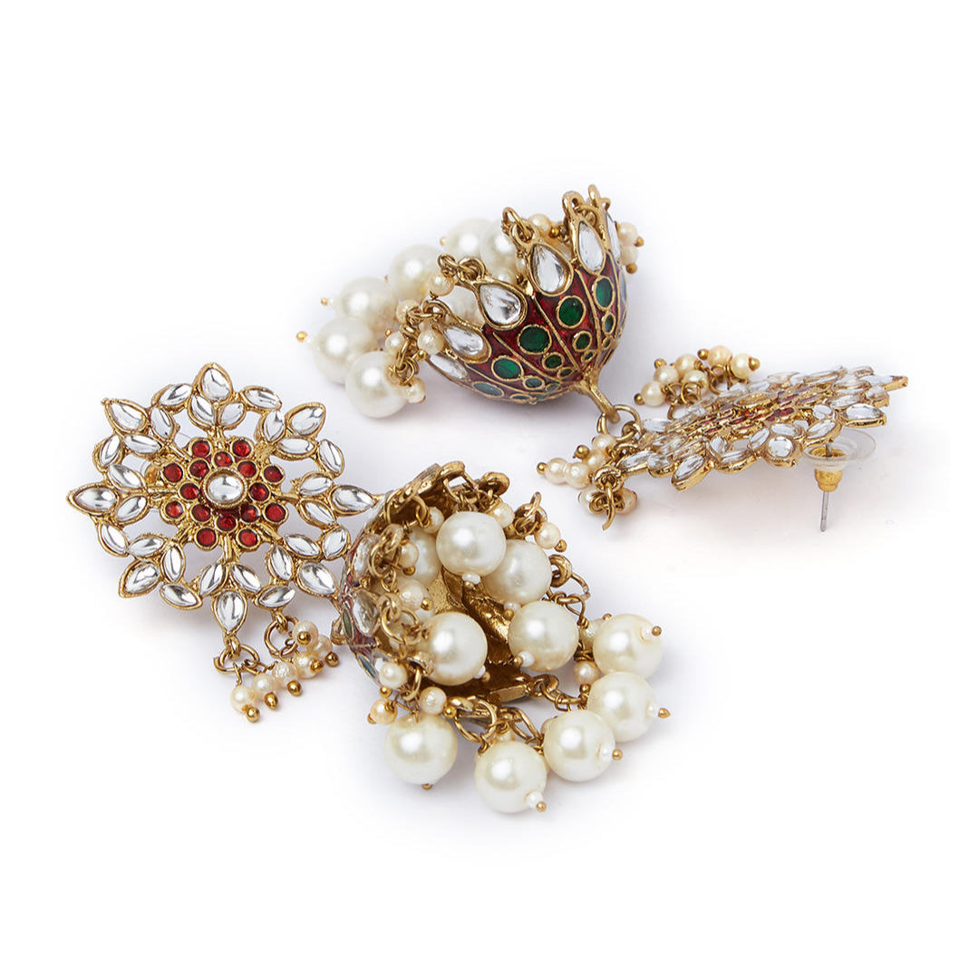 Gold plated enameled jhumka earrings with maroon kundan stones and pearl embellishments