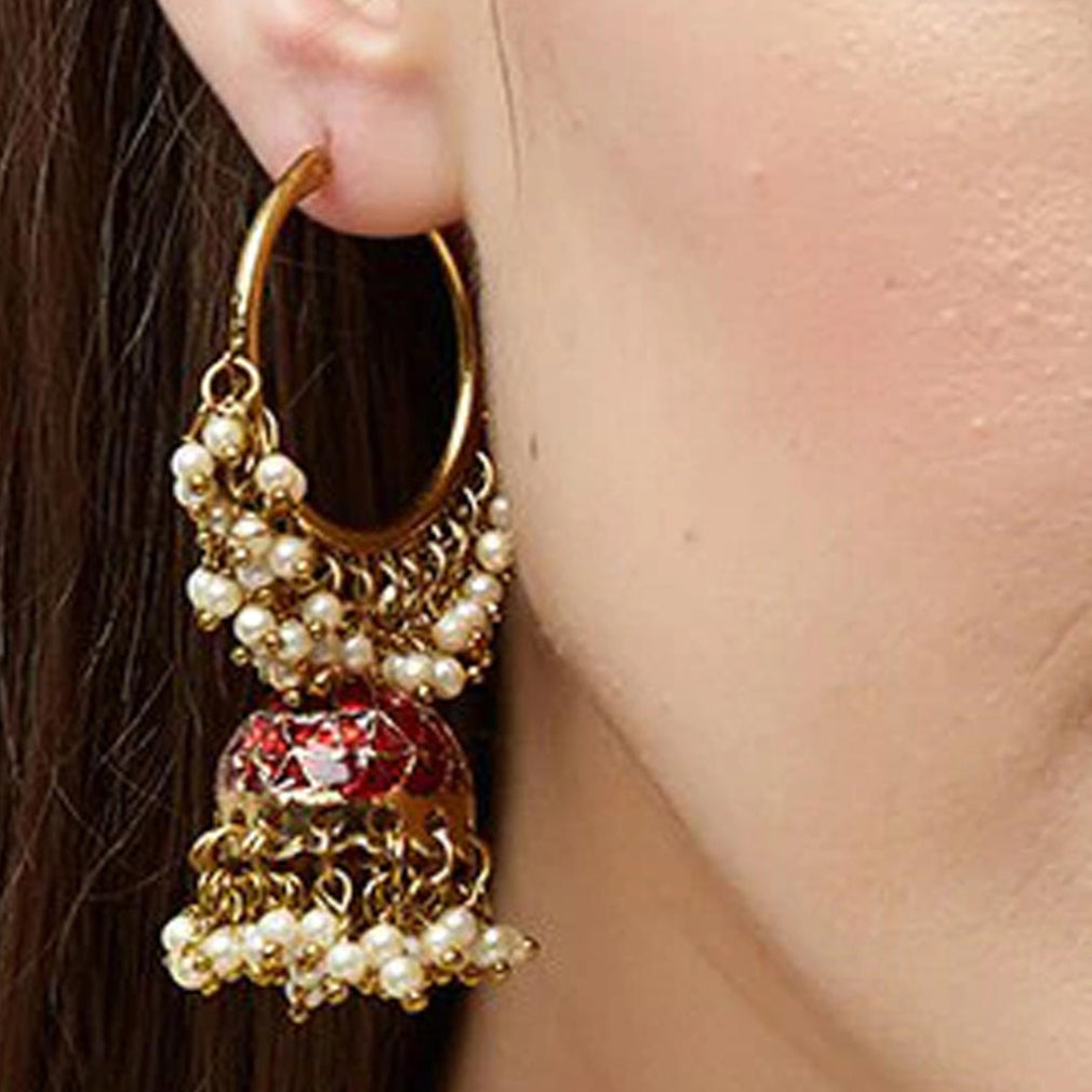 A pair of gold-plated hoop jhumka earrings with red enamel and white beads embellishments