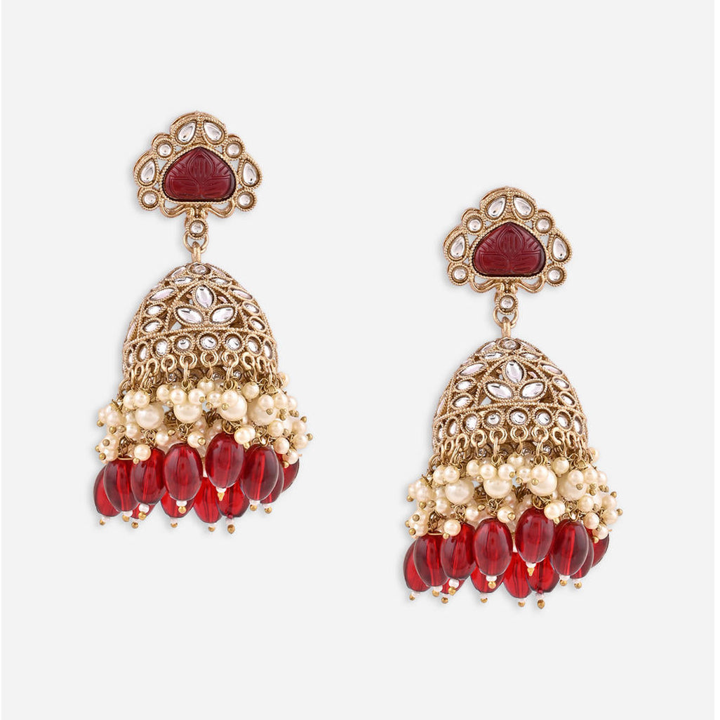 merlot burgundy jhumka earrings with kundan stones, beige pearls, and maroon beads.