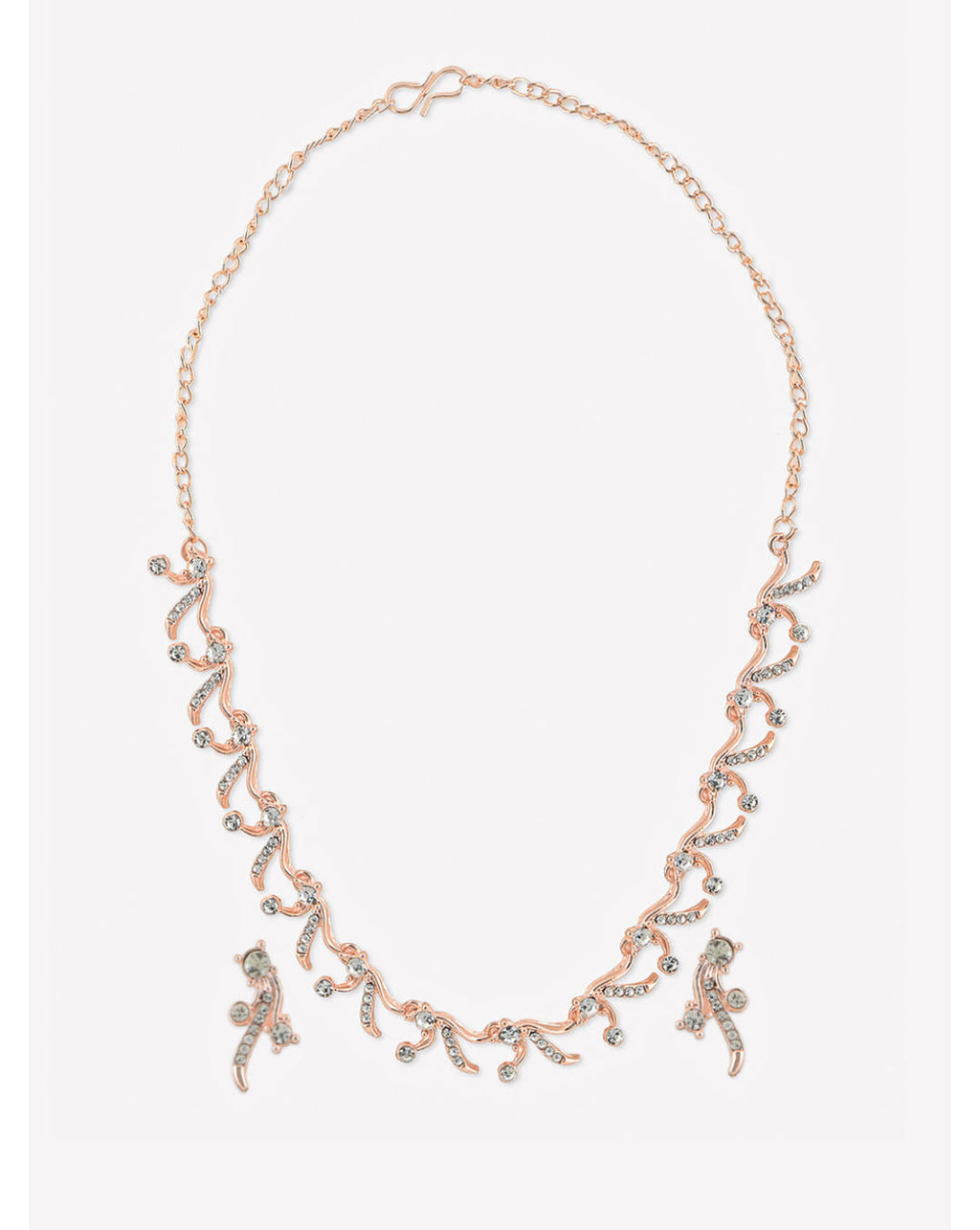 a rose gold floral party necklace and earrings set with sparkling stones.