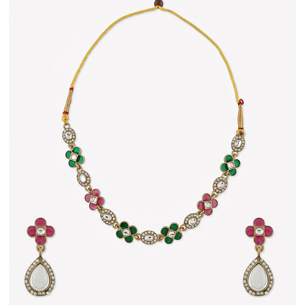 a multicolored traditional jewelry set which includes a floral design necklace and matching earrings.