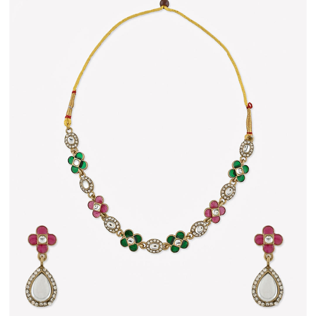 a multicolored traditional jewelry set which includes a floral design necklace and matching earrings.