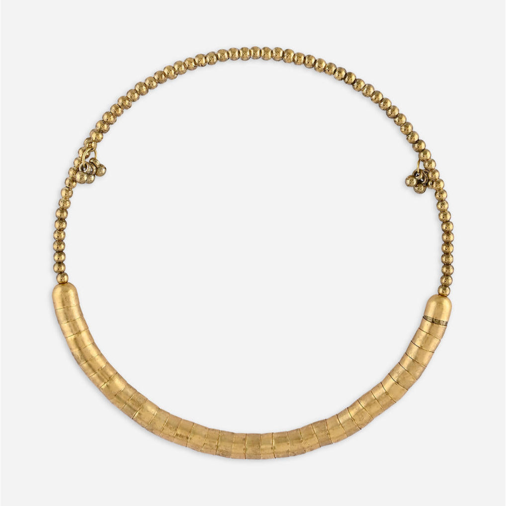 gold-toned choker necklace with a curved rod design covered in fused beads.