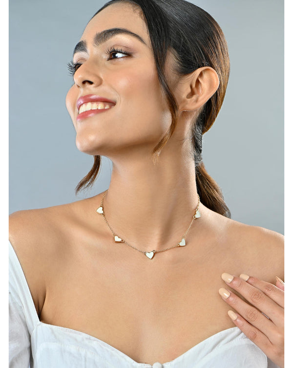 Necklace with heart-shaped multi charm pendants